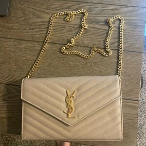 Beige YSL CASSANDRE ENVELOPE CHAIN WALLET IN GRAIN DE POUDRE LEATHER never worn